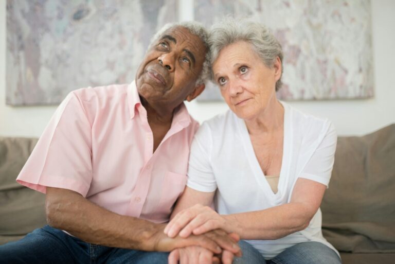 Elderly person reviewing social security benefits at age 62