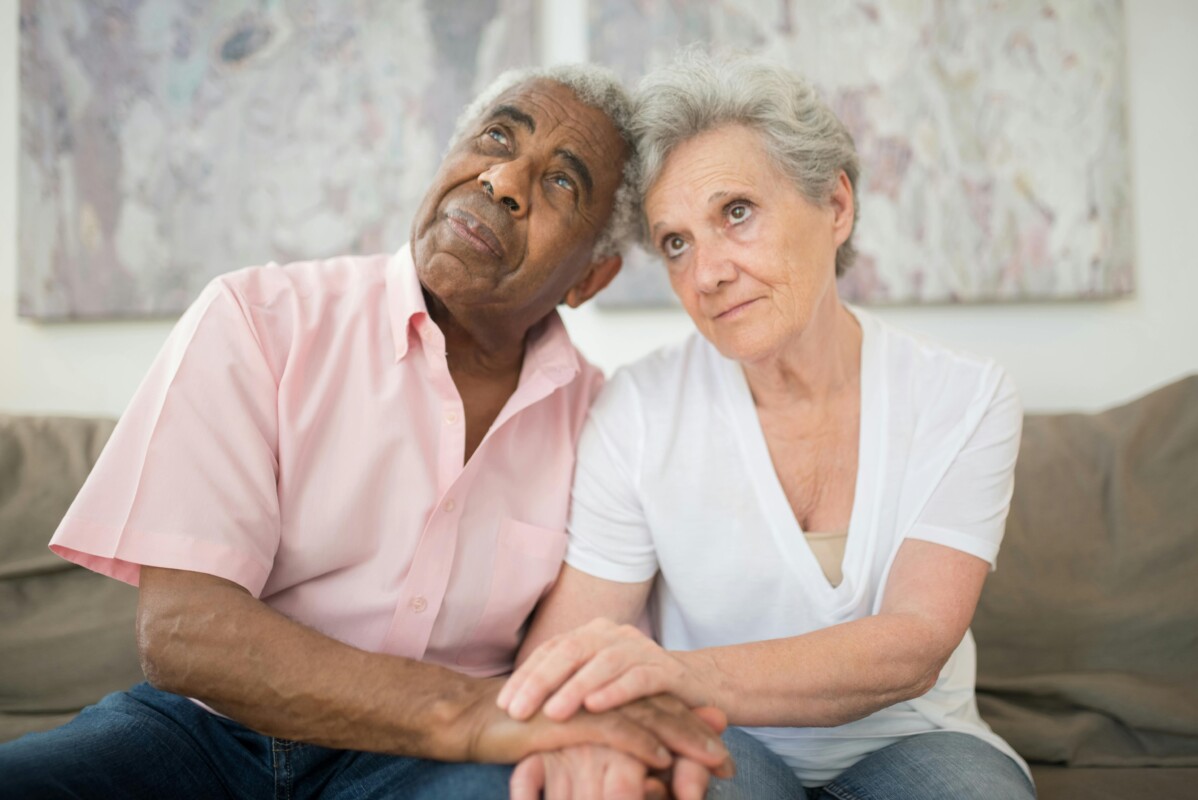 Elderly person reviewing social security benefits at age 62